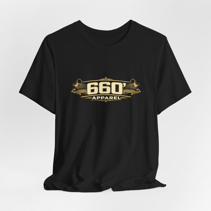 Hanging black vintage gold helmet tee with wide cream-and-gold 660′ Apparel front logo