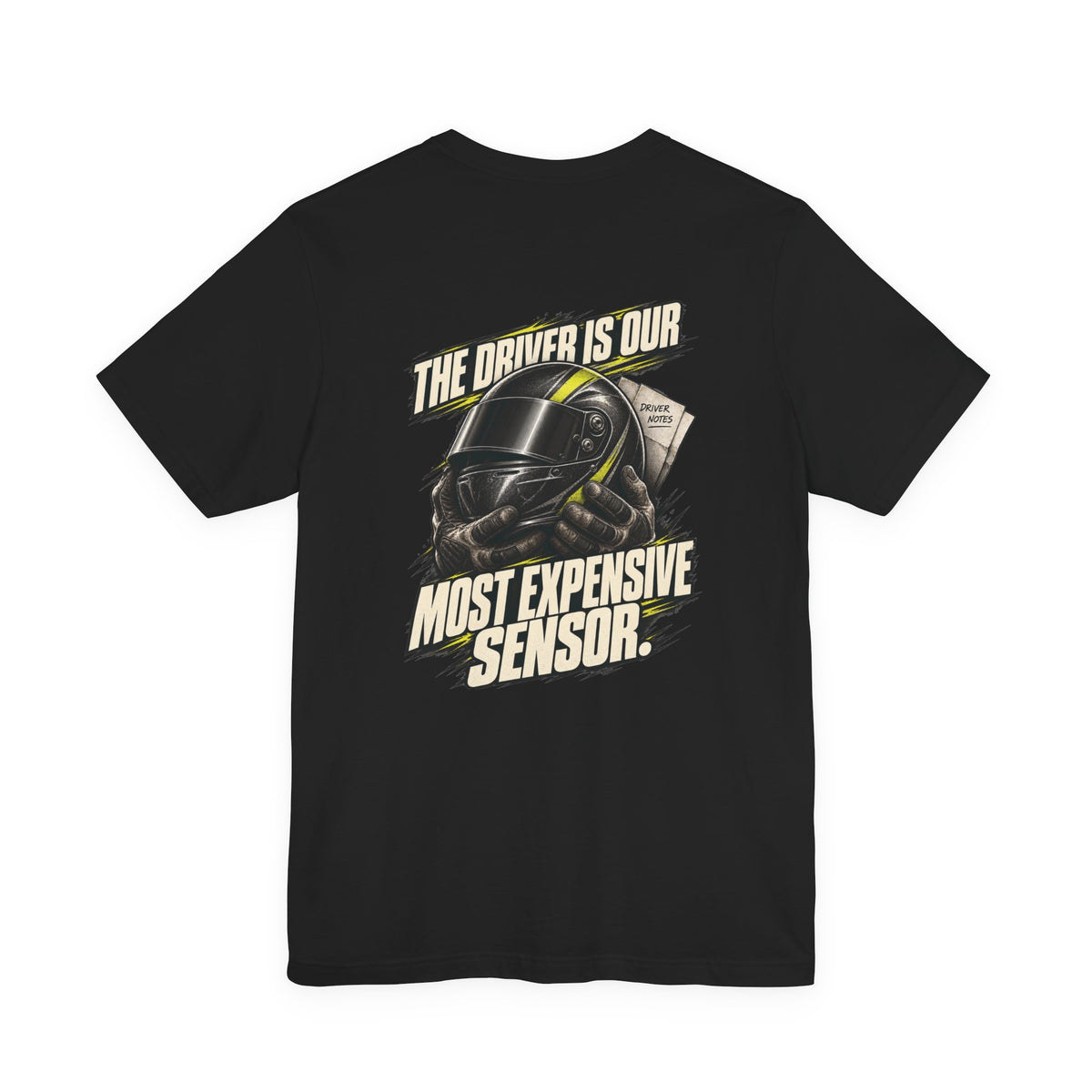 The Driver Is Our Most Expensive Sensor. — Pit Crew Tee — back graphic on black Bella+Canvas 3001
