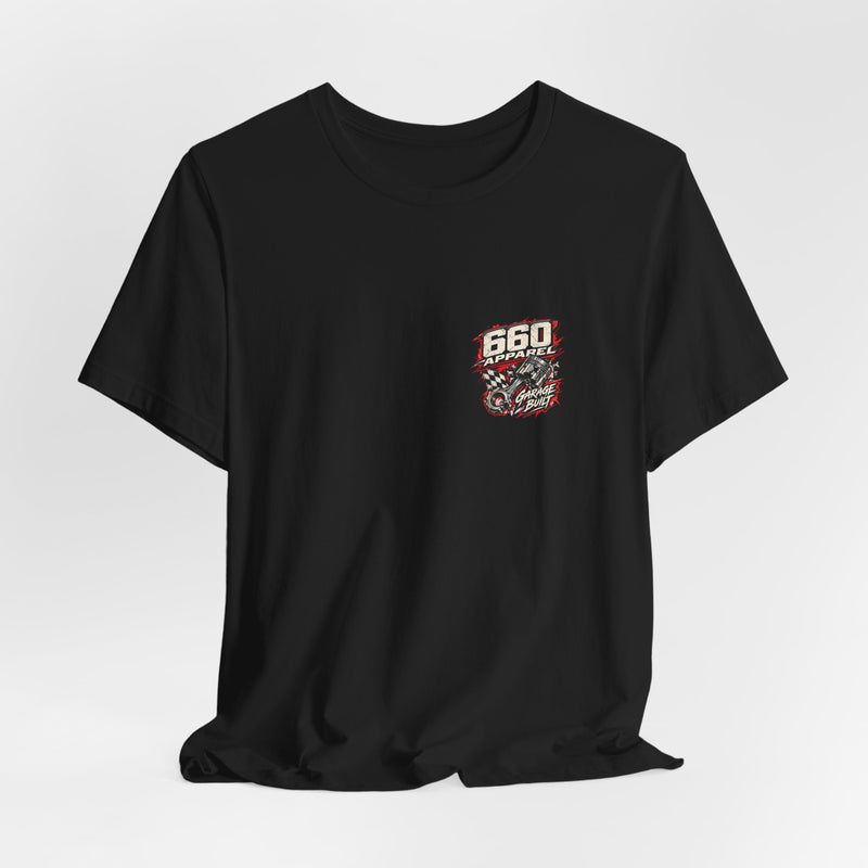Hanging black Will Work for Bananas tee showing its small Garage Built left-chest emblem