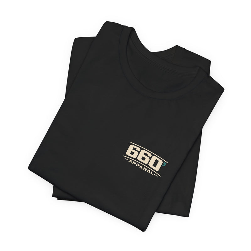 Folded black tee showing the matching official 660 Apparel chest mark