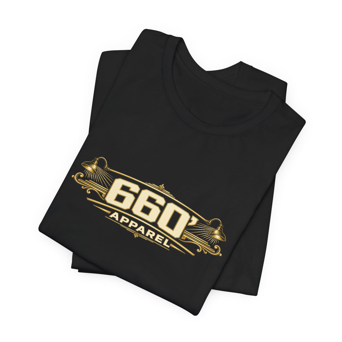 Folded black vintage gold helmet tee showing the wide 660′ Apparel chest logo