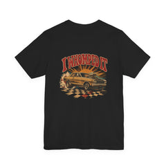 Back of black Bella+Canvas 3001 tee with I Whomped It lettering and vintage door car at the finish stripe