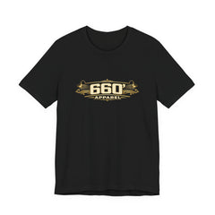 Front of black Bella+Canvas 3001 with wide cream-and-gold 660′ Apparel logo, shop lamps and engraved ornament