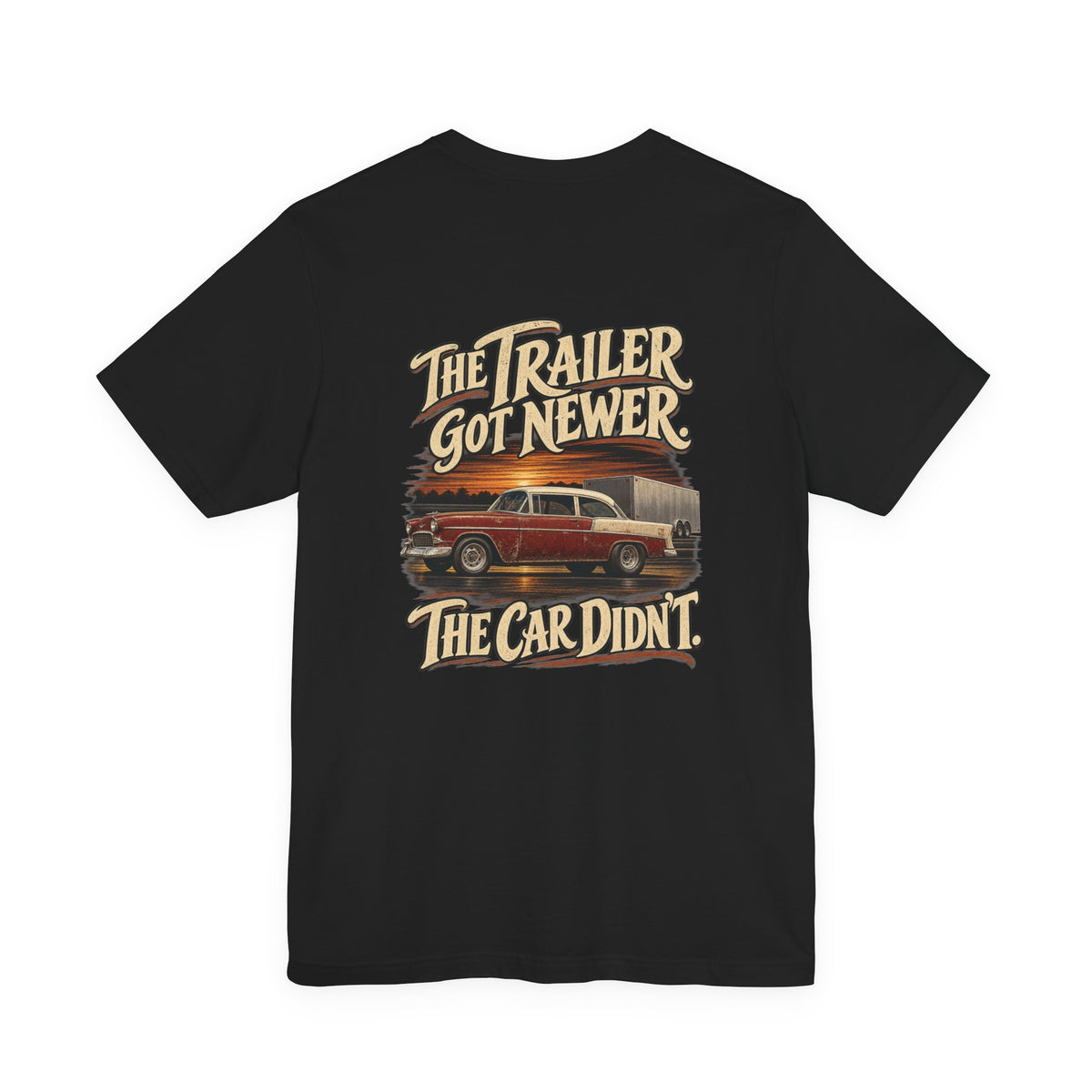The Trailer Got Newer. The Car Didn't. — Old School Tee — back graphic on black Bella+Canvas 3001
