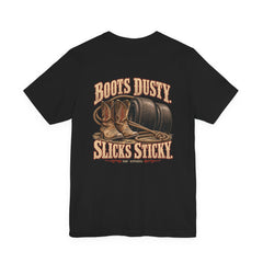 Back of black Bella+Canvas 3001 tee showing Boots Dusty. Slicks Sticky. artwork