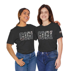 Models wearing black GIGI burnout varsity t shirts styled with jeans for racing grandma apparel