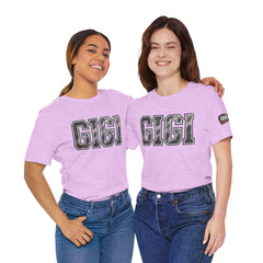 Models wearing GIGI racing grandma t shirts in purple and pink with burnout style lettering