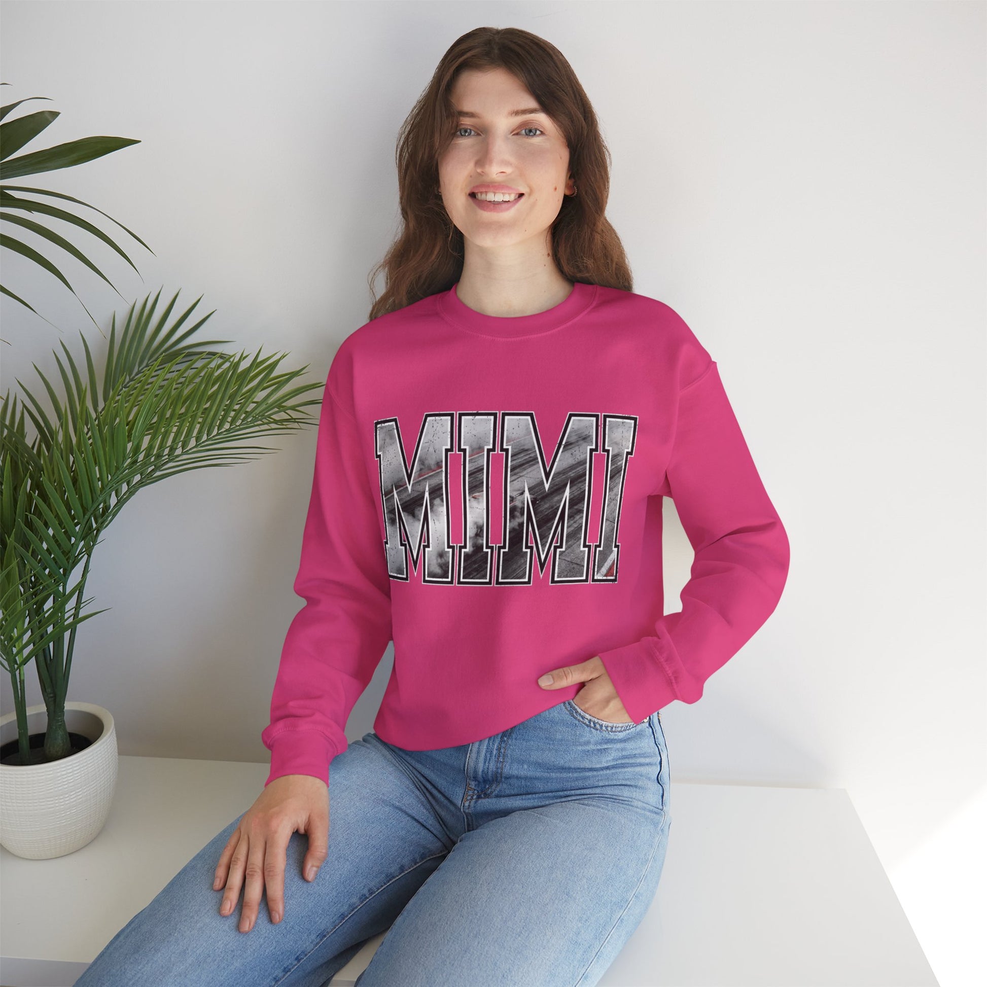 Pink MIMI racing grandma sweatshirt with drag racing varsity lettering on model