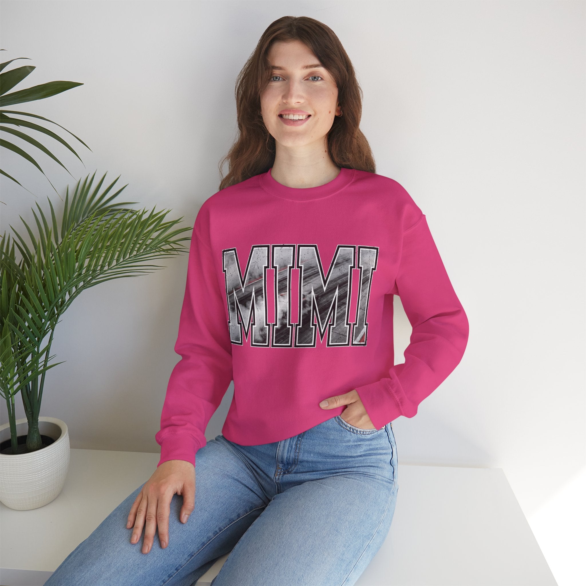 Pink MIMI racing grandma sweatshirt with drag racing varsity lettering on model